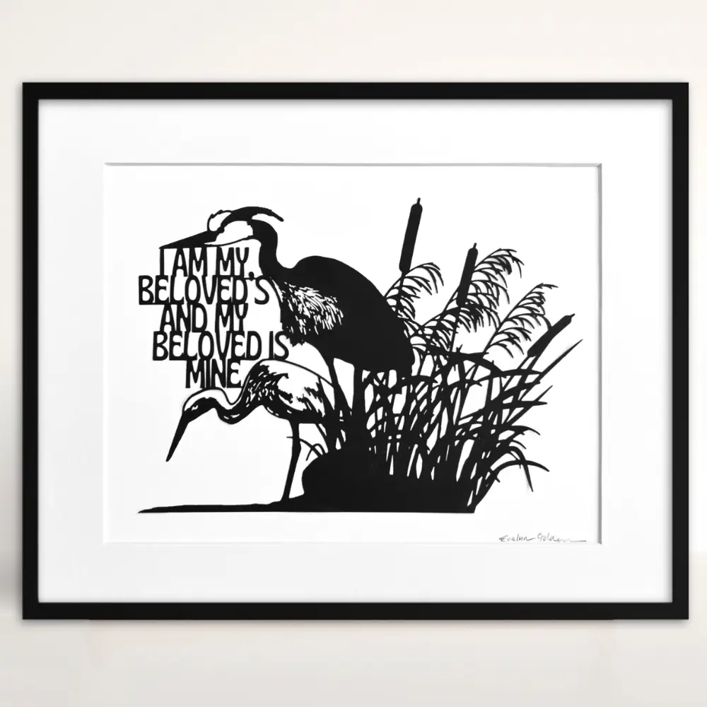 Black papercut artwork depicting two herons in a marsh setting with cattails and reeds. The artwork includes English text and is set against a white background. The herons are in silhouette.