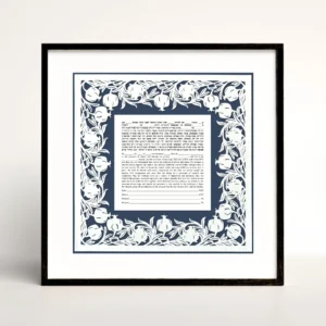 blue pomegranate papercut border around square ketubah in a black frame.