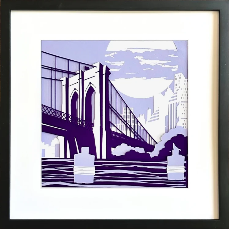 This stylized artwork depicts the Brooklyn Bridge spanning the East River under a large, cloud-obscured moon. In the foreground, two cylindrical pilings with white bands rise from the water. The cityscape of New York City is visible in the background, rendered in minimalist white silhouettes. The use of purple and white creates a striking, graphic contrast.