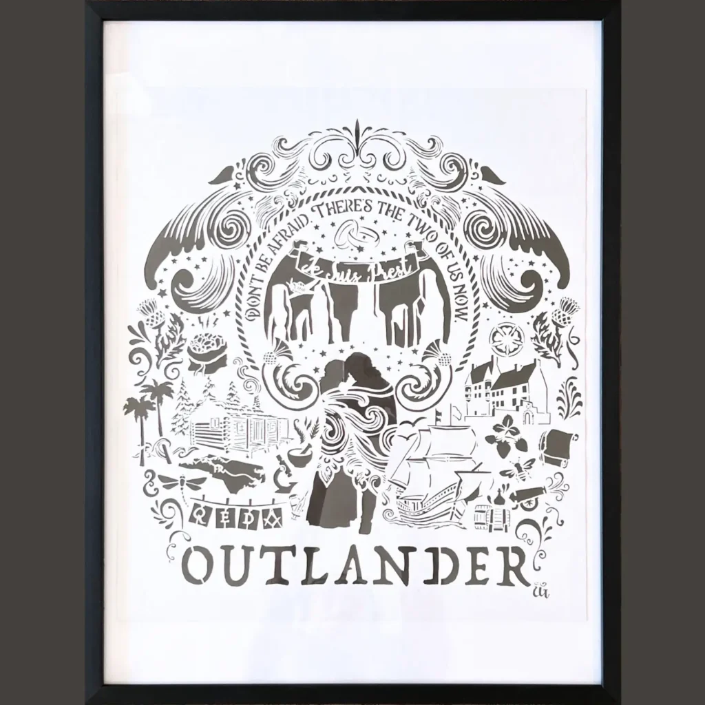 Outlander-inspired papercut with a variety of book and tv series motifs