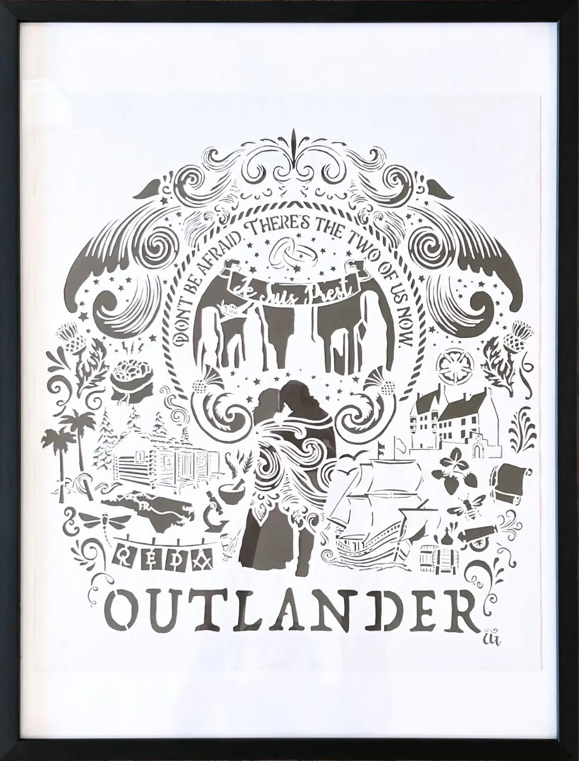 Outlander-inspired papercut with a variety of book and tv series motifs
